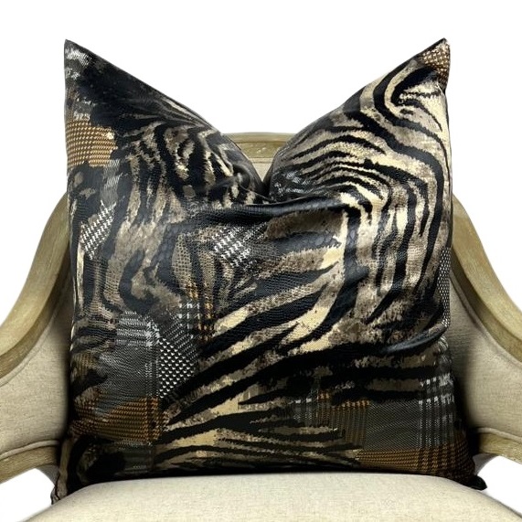 Wild multi patterned decorative pillow with a medley of zebra and patches of unique patterns