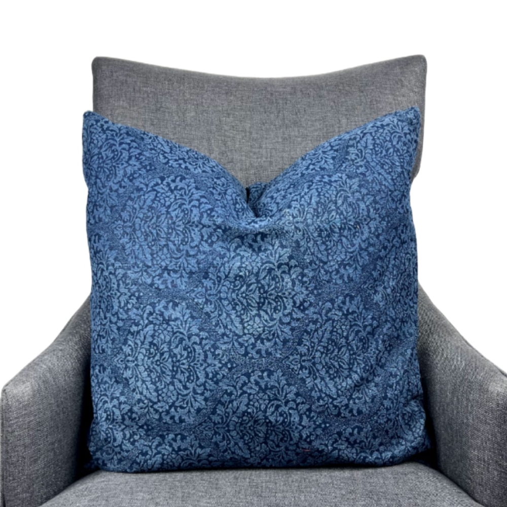 Handcrafted double-sided embossed floral design on dark blue