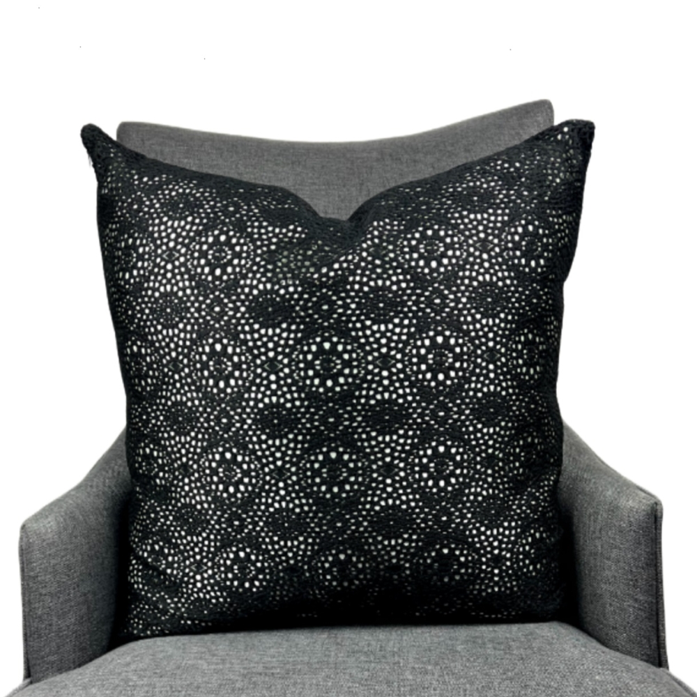 Elegant black crochet pillow with silk silver lining